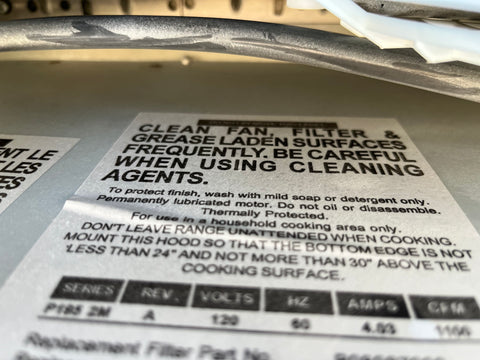 Close-up view of BEST P195 label detailing cleaning instructions. 