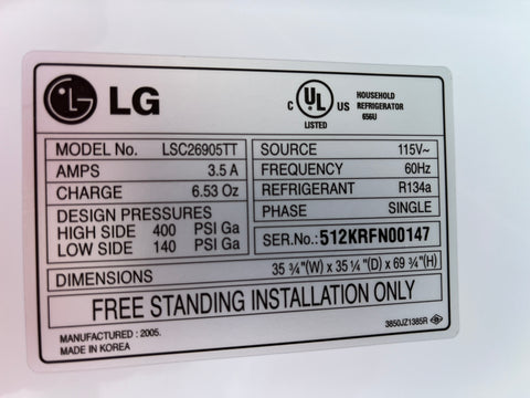 Close up of label inside good used LG LSC26905TT refrigerator. 