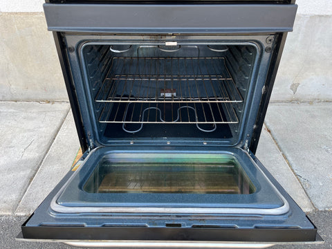 Interior view of lower oven of G.E. double oven, model # JTP50S0H2SS. 