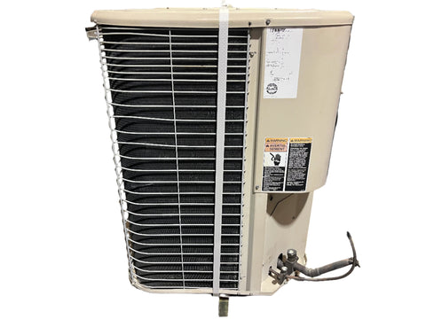 Side view of used Lennox 4-ton air conditioning condenser. 