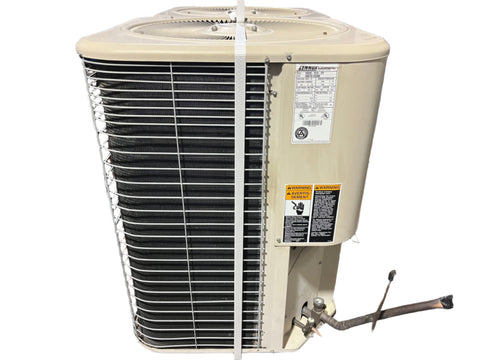 Side view of used Lennox HS29-513-2Y AC condenser. 