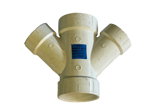 New Charlotte Pipe model # 612, all hub, 4"x4"x3"x3" reducing double wye for non-pressure DWV applications made of schedule 40 white PVC. 