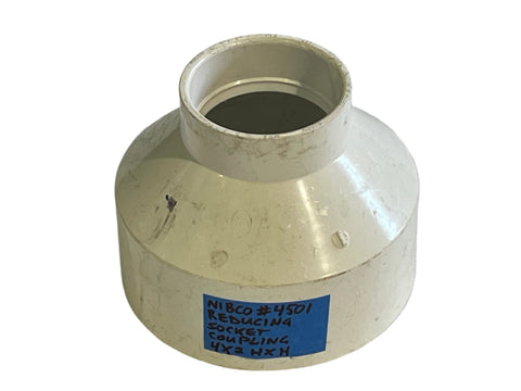 New Nibco #4501 4x2 reducing socket coupling for non-pressure DWV use, made of schedule 40 white PVC. 