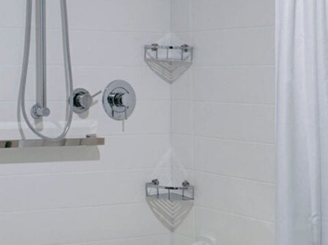 Stock image of new WingIts WCONCBPS8 bathroom shower corner baskets for amenity storage. 8" size, made of polished stainless steel. 