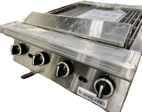 Front view of new Garland commercial gas charbroiler. 24" wide, 72,000 BTU, 4 burner. Model #GTBG24-AR24.