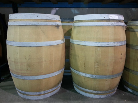 Oak wine barrels with only one fermenting process; note the absence of much staining. Material Resourcers repurposes materials from industrial & manufacturing companies. Bring us your waste, excess, non-recyclable, by-product, remnant, blemished, cancelled, and expired materials.