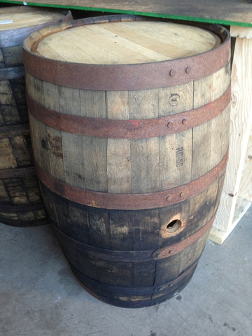 Single reclaimed whiskey barrel. Material Resourcers repurposes materials from industrial & manufacturing companies. Bring us your waste, excess, non-recyclable, by-product, remnant, blemished, cancelled, and expired materials.